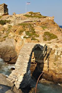 Preview wallpaper greece, rock, arch, flag