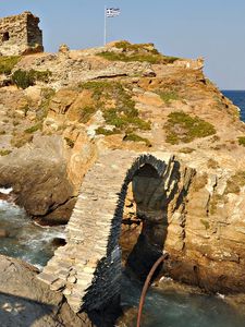 Preview wallpaper greece, rock, arch, flag