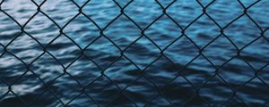 Preview wallpaper grid, fence, sea, water