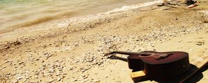 Preview wallpaper guitar, beach, coast, sand, stones, romanticism