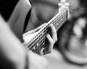 Preview wallpaper guitar, guitarist, bw, blur, musical instrument