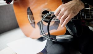 Preview wallpaper guitar, guitarist, headphones, music
