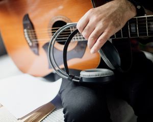 Preview wallpaper guitar, guitarist, headphones, music