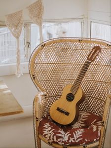 Preview wallpaper guitar, musical instrument, armchair, brown