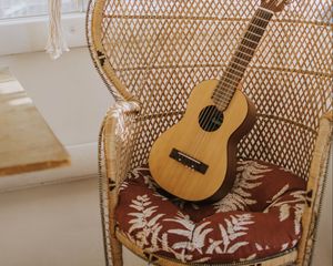 Preview wallpaper guitar, musical instrument, armchair, brown