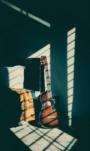 Preview wallpaper guitar, musical instrument, brown, dark, shadow