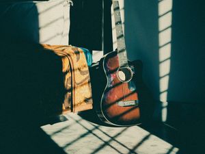 Preview wallpaper guitar, musical instrument, brown, dark, shadow