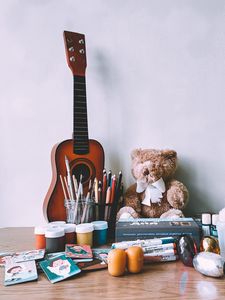 Preview wallpaper guitar, musical instrument, paints, pencils, toy