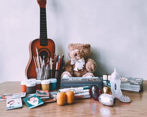 Preview wallpaper guitar, musical instrument, paints, pencils, toy