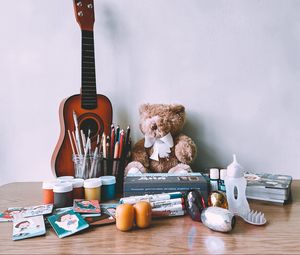 Preview wallpaper guitar, musical instrument, paints, pencils, toy
