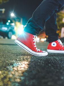 Preview wallpaper gumshoes, legs, asphalt, glare, red