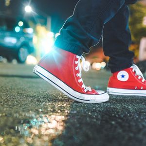 Preview wallpaper gumshoes, legs, asphalt, glare, red