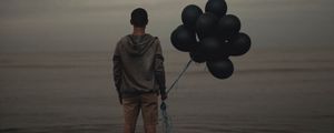 Preview wallpaper guy, balloons, sea, loneliness