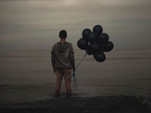 Preview wallpaper guy, balloons, sea, loneliness