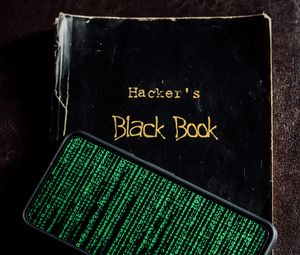 Preview wallpaper hacker, book, phone, matrix