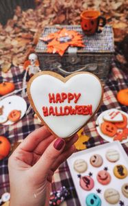 Preview wallpaper halloween, cookies, hand, picnic