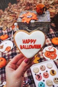 Preview wallpaper halloween, cookies, hand, picnic