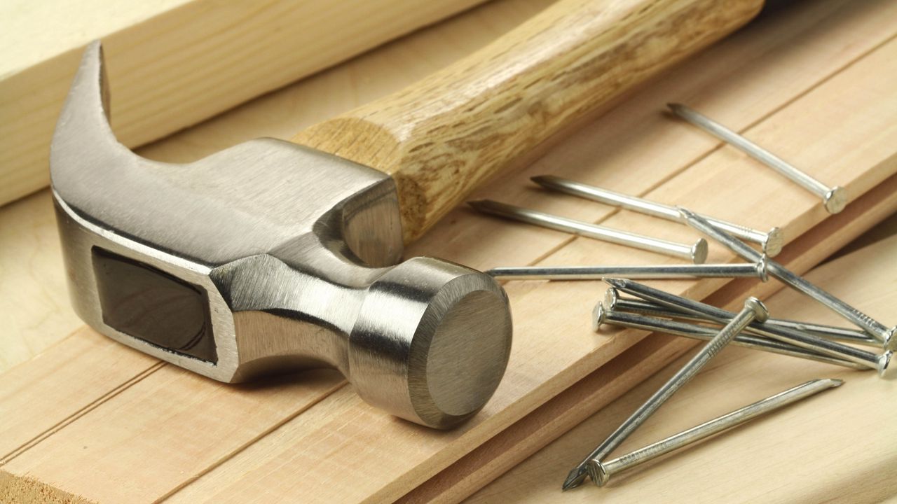 Wallpaper hammer, nails, wood