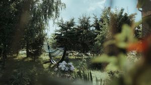 Preview wallpaper hammock, grass, vegetation, nature