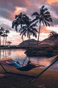 Preview wallpaper hammock, lake, palm trees, mountains, rest