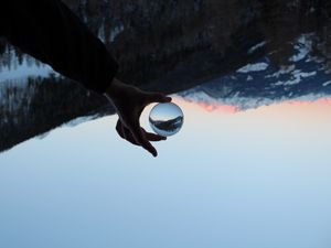 Preview wallpaper hand, ball, reflection, mountains