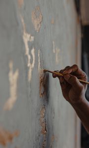 Preview wallpaper hand, brush, wall, paint, gold, art