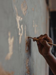 Preview wallpaper hand, brush, wall, paint, gold, art