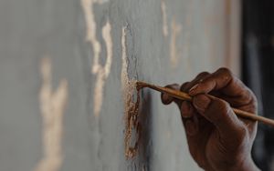 Preview wallpaper hand, brush, wall, paint, gold, art