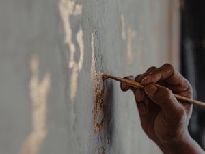 Preview wallpaper hand, brush, wall, paint, gold, art