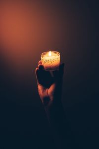 Preview wallpaper hand, candle, fire, dark