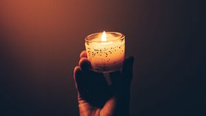 Preview wallpaper hand, candle, fire, dark