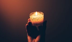 Preview wallpaper hand, candle, fire, dark