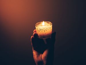 Preview wallpaper hand, candle, fire, dark