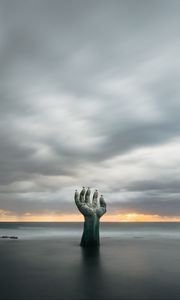 Preview wallpaper hand, coast, sand, clouds, wet