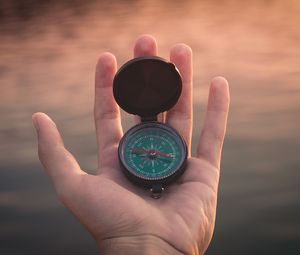 Preview wallpaper hand, compass, travel, cardinal points