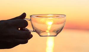 Preview wallpaper hand, cup, sunset, sun