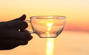 Preview wallpaper hand, cup, sunset, sun