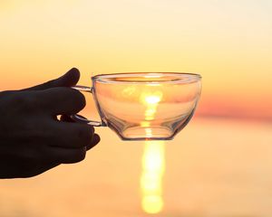 Preview wallpaper hand, cup, sunset, sun