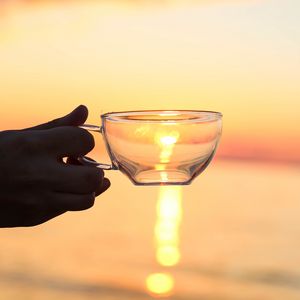 Preview wallpaper hand, cup, sunset, sun