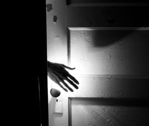 Preview wallpaper hand, door, bw, light, gloomy