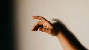 Preview wallpaper hand, fingers, rays, wall