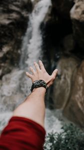 Preview wallpaper hand, fingers, wrist watches, waterfall