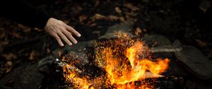 Preview wallpaper hand, fire, sparks, bonfire