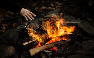 Preview wallpaper hand, fire, sparks, bonfire