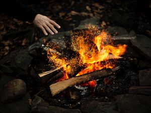 Preview wallpaper hand, fire, sparks, bonfire