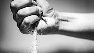 Preview wallpaper hand, fist, sand, black and white