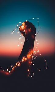 Preview wallpaper hand, garland, bulbs, light, night