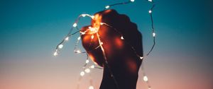 Preview wallpaper hand, garland, bulbs, light, night