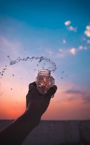 Preview wallpaper hand, jar, spray, drops, water, spill