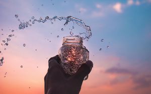 Preview wallpaper hand, jar, spray, drops, water, spill